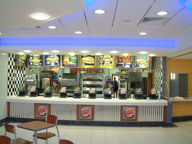 Burger King Bristol restaurant counter with menu boards and ordering area.