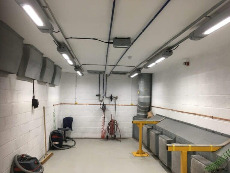 Electrical wiring and panel setup in a commercial or industrial space.