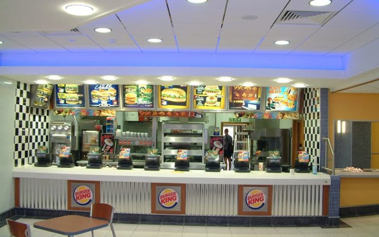 Burger King Bristol restaurant counter with menu boards and ordering area.