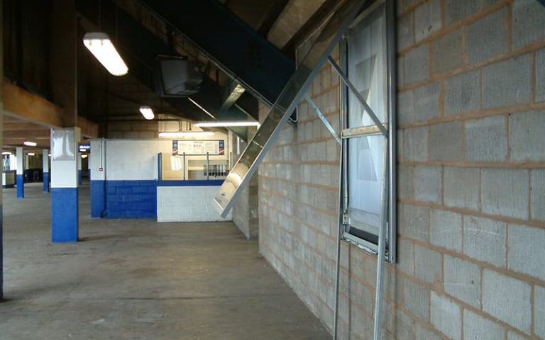 Electrical wiring and conduit installation at a football stadium.