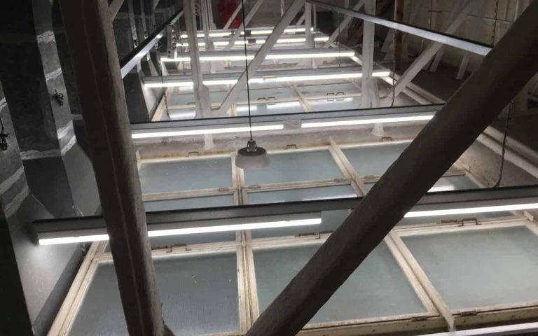 LED lighting installation in commercial building for energy efficiency.